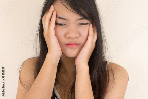 Woman having a headache.