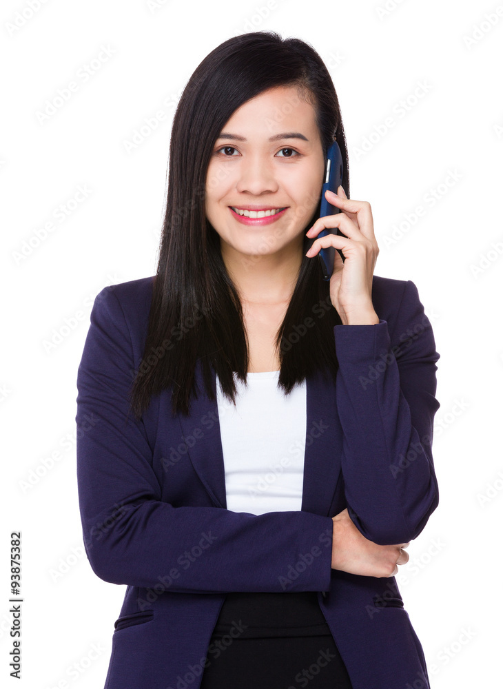 Asian businesswoman chat on mobile phone Asian businesswoman chat on mobile phone