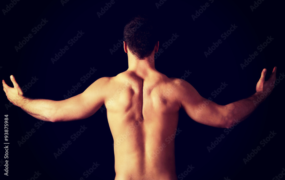 Fototapeta premium Sexy muscular man showing his muscular back.