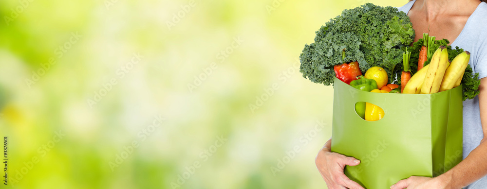 Woman hands with grocery bag of vegetables. Woman hands with grocery bag of vegetables.
