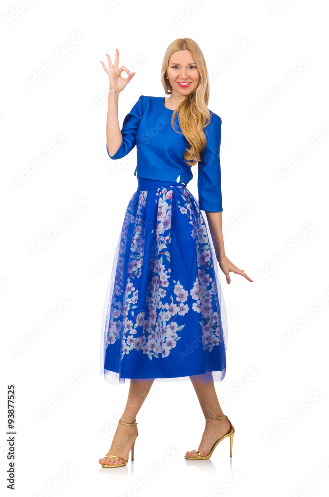 Fototapeta premium Woman in blue dress with flower prints isolated on white