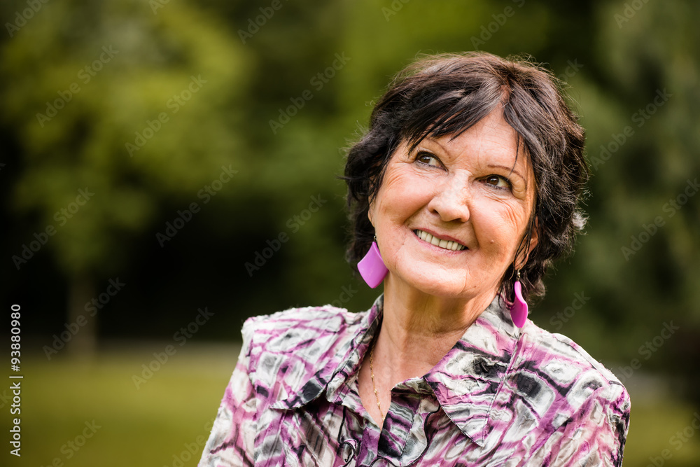 Senior woman outside portrait Senior woman outside portrait