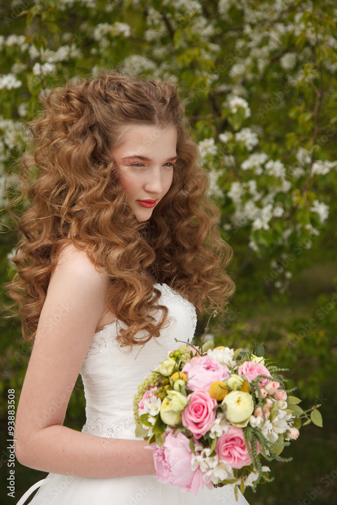 Naklejka premium Young bride with flowers