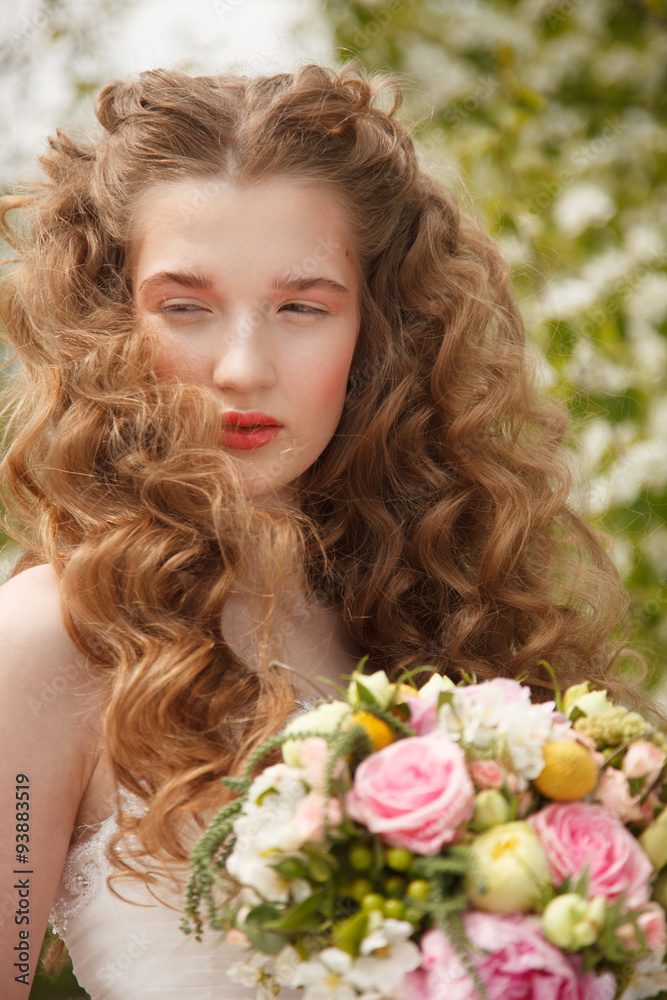 Naklejka premium Young bride with flowers