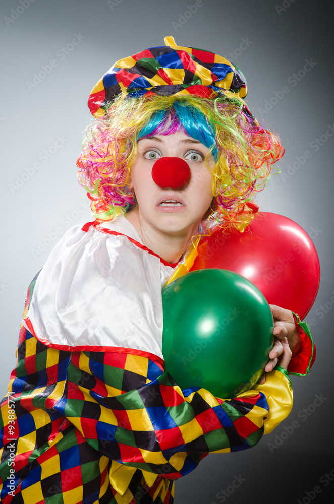 Funny clown in comical concept Funny clown in comical concept