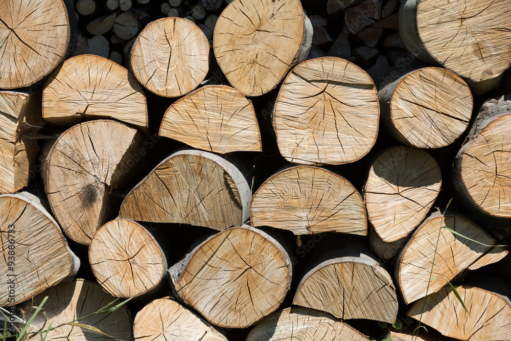 dry chopped firewood logs in a pile dry chopped firewood logs in a pile