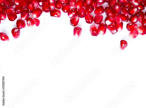 pomegranate seeds isolated on white