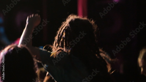 Guy with the dreadlocks at a rock concert photo