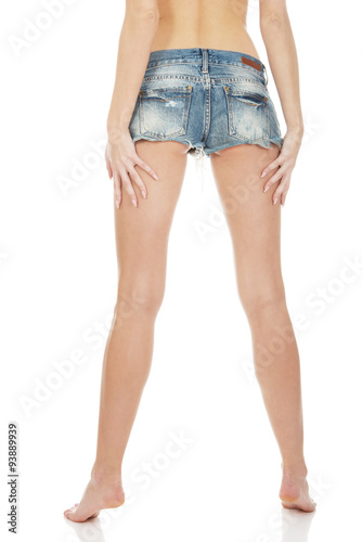 Sexy woman in jeans shorts. 