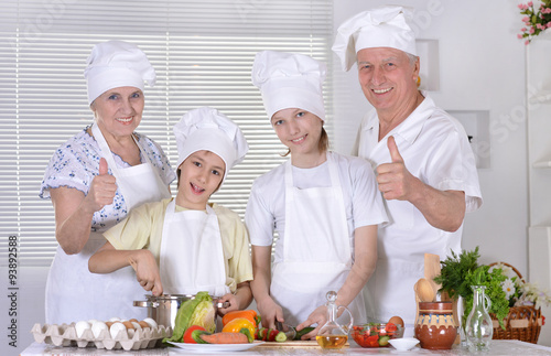 Happy family cooking together