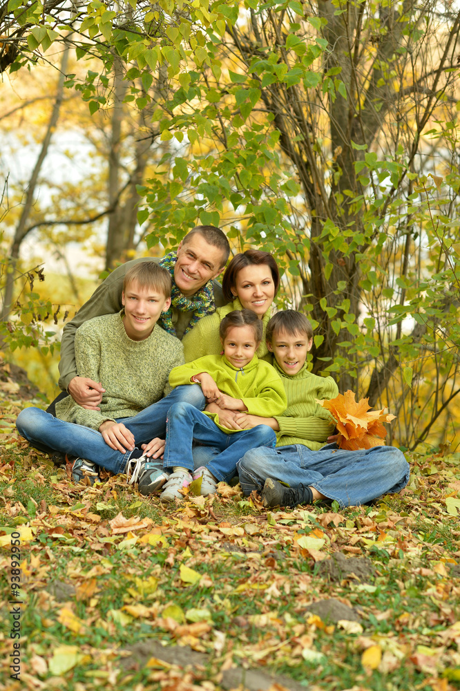 Family in autumn park