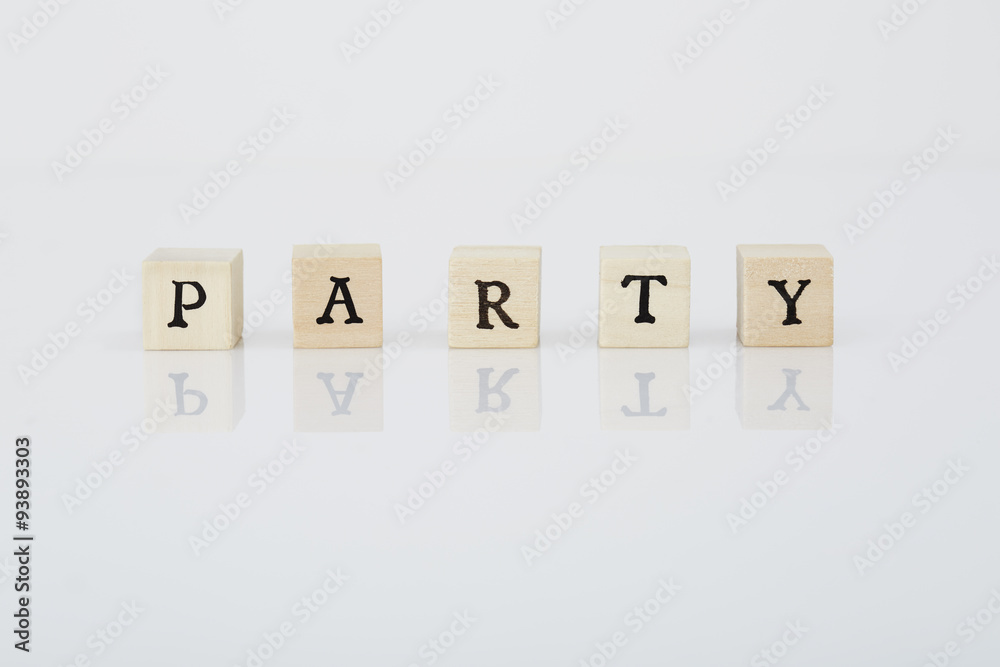 Scrabble tiles spell 'Party' in studio Scrabble tiles spell 'Party' in studio