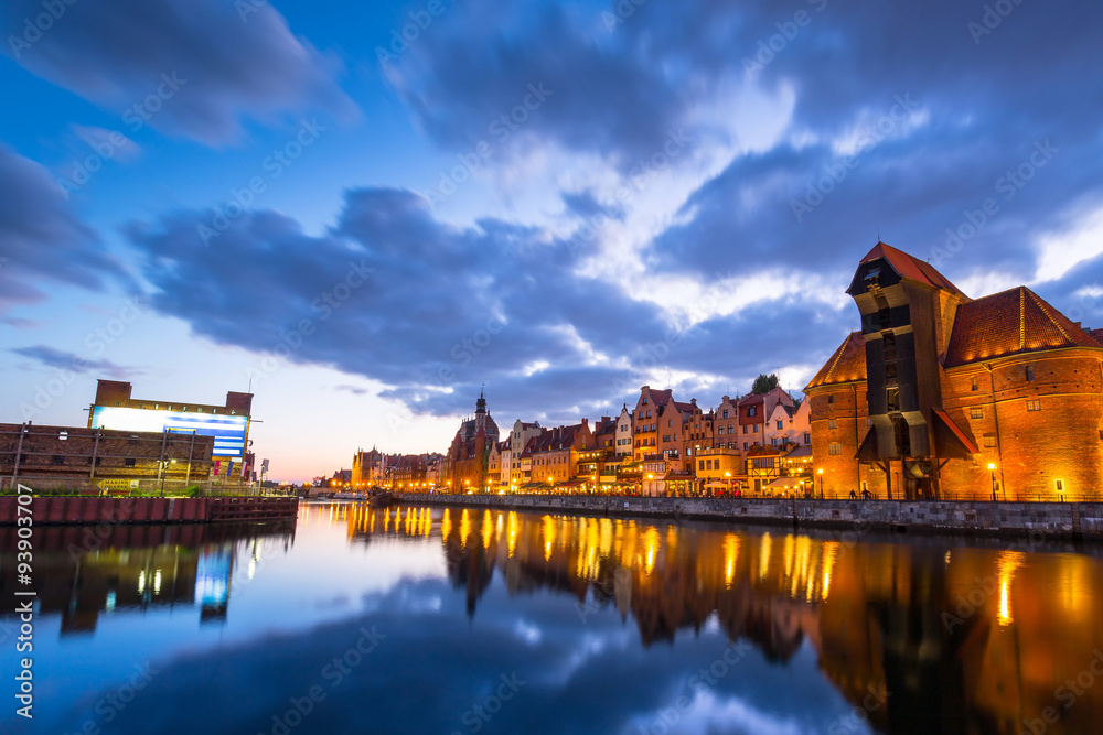 Fototapeta premium Old town of Gdansk with ancient crane at dusk, Poland