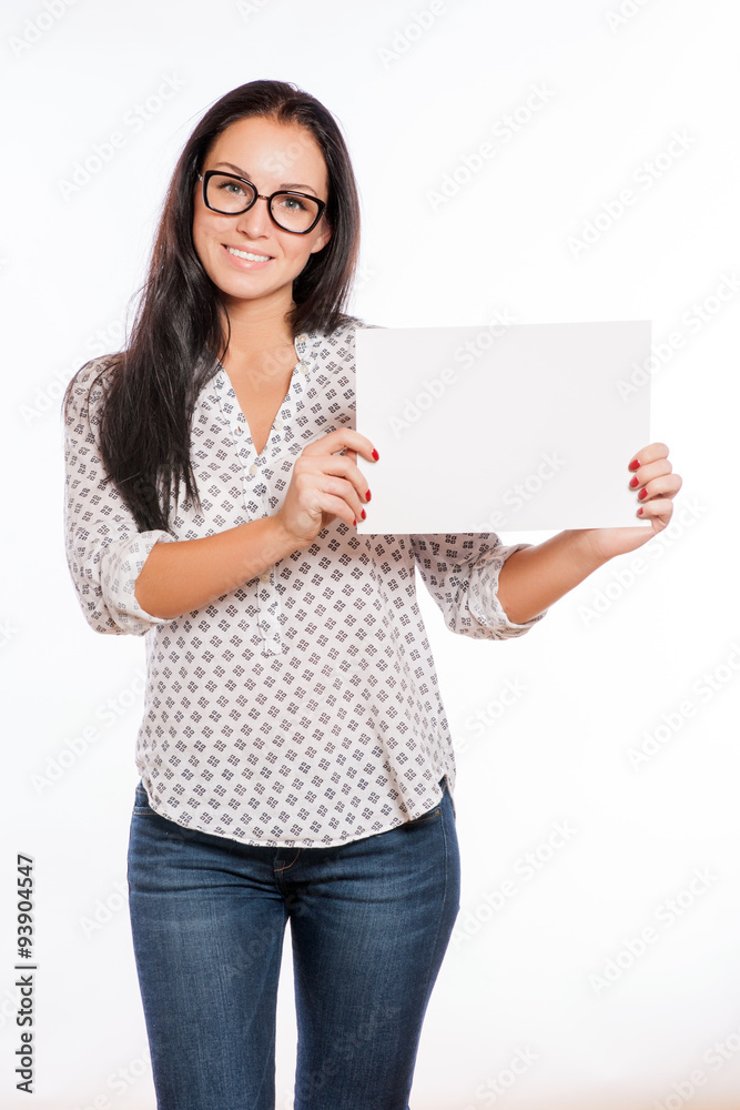 Portrait of cheerful beautiful woman showing blank signboard wit Portrait of cheerful beautiful woman showing blank signboard wit