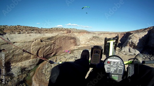Ultralight following two power parachute through gorge canyon P HD 0018 photo