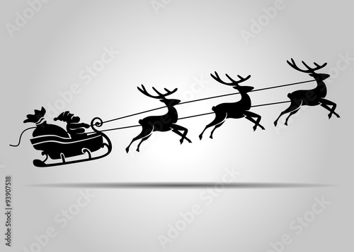 Vector silhouette of Santa Claus on Christmas sleigh photo