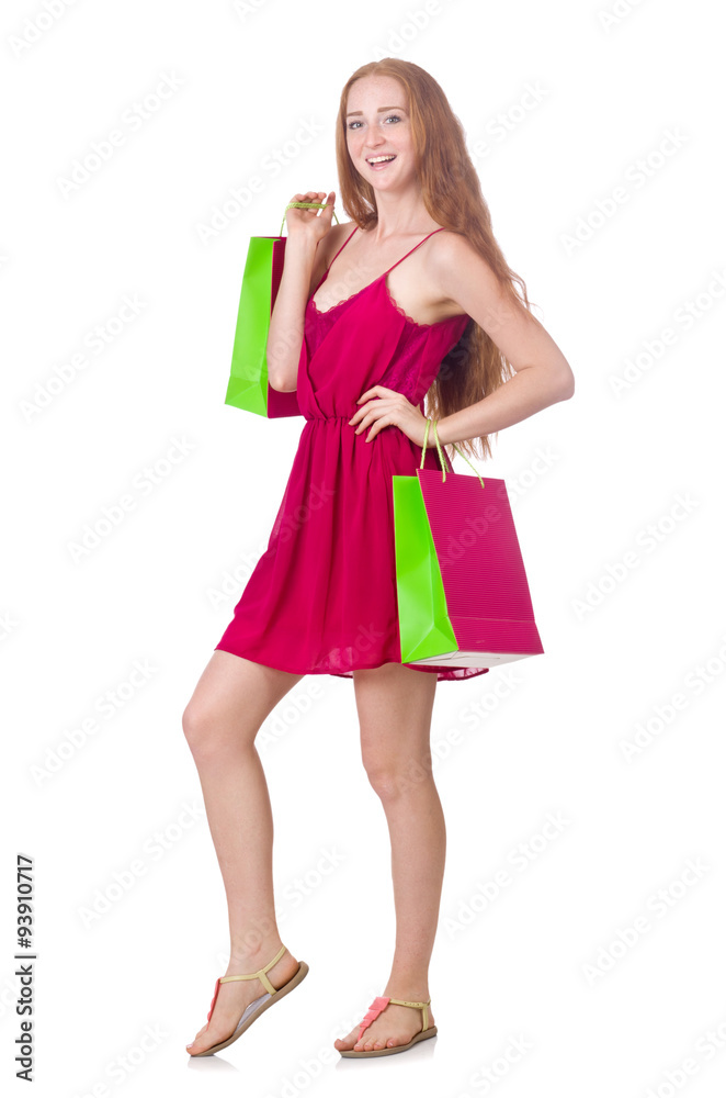 Woman with shopping bags isolated on white