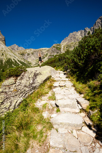 Yoga exercising in Tatry mountains photo