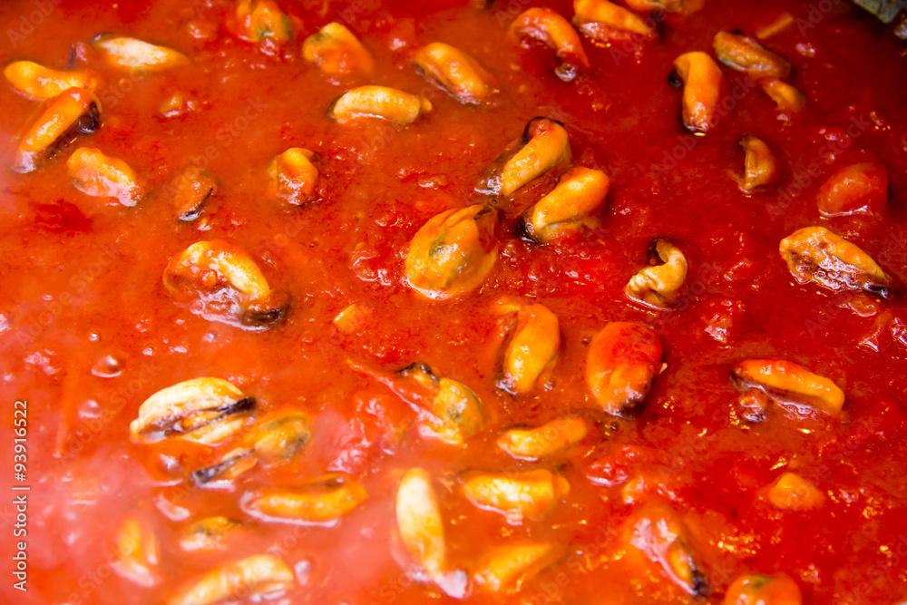 Sauce of mussels from above while cooking Sauce of mussels from above while cooking