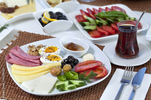 Rich and delicious Turkish breakfast on white wood table