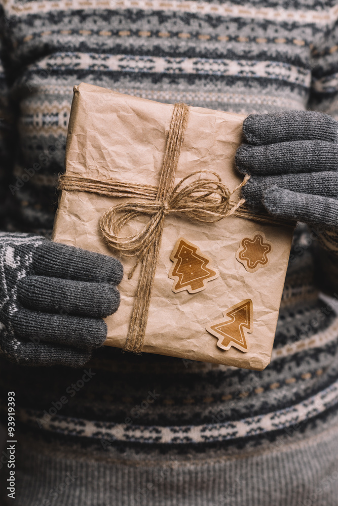 Woman holding Christmas Gift Woman holding Christmas Gift