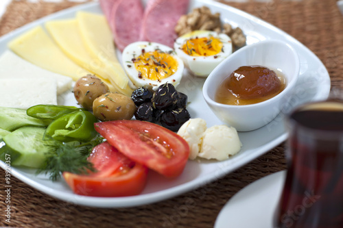 Rich and delicious Turkish breakfast on white wood table