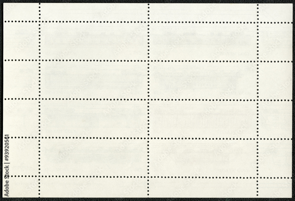Obraz premium Blank postage stamp block souvenir sheet on a black background