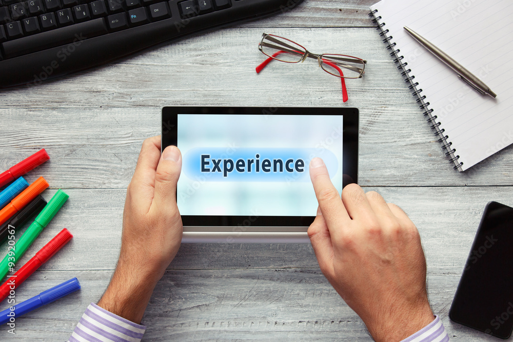 Businessmen using touchpad. Pressing experience button. Businessmen using touchpad. Pressing experience button.