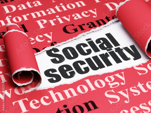 Security concept: black text Social Security under the piece of