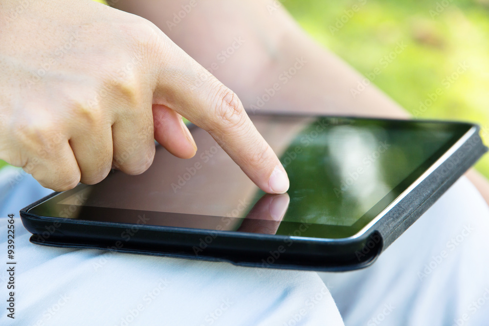 business woman using digital tablet