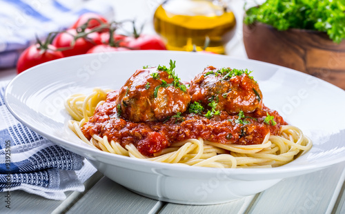 Meat balls. Italian and Mediterranean cuisine. Meat balls with spaghetti and tomato sauce. traditional kitchen. 