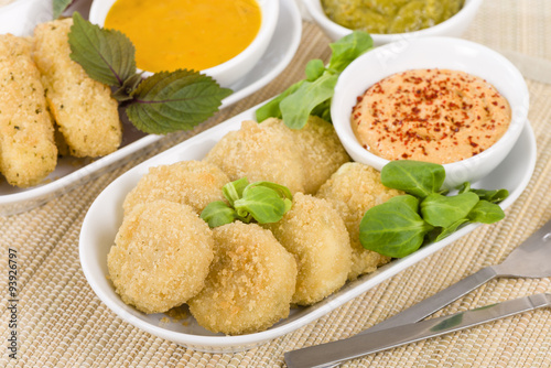 Deep Fried Cheese - Breaded and deep fried cheese served with dipping sauce.
