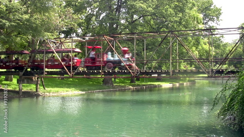 Train park crossing bridge side photo