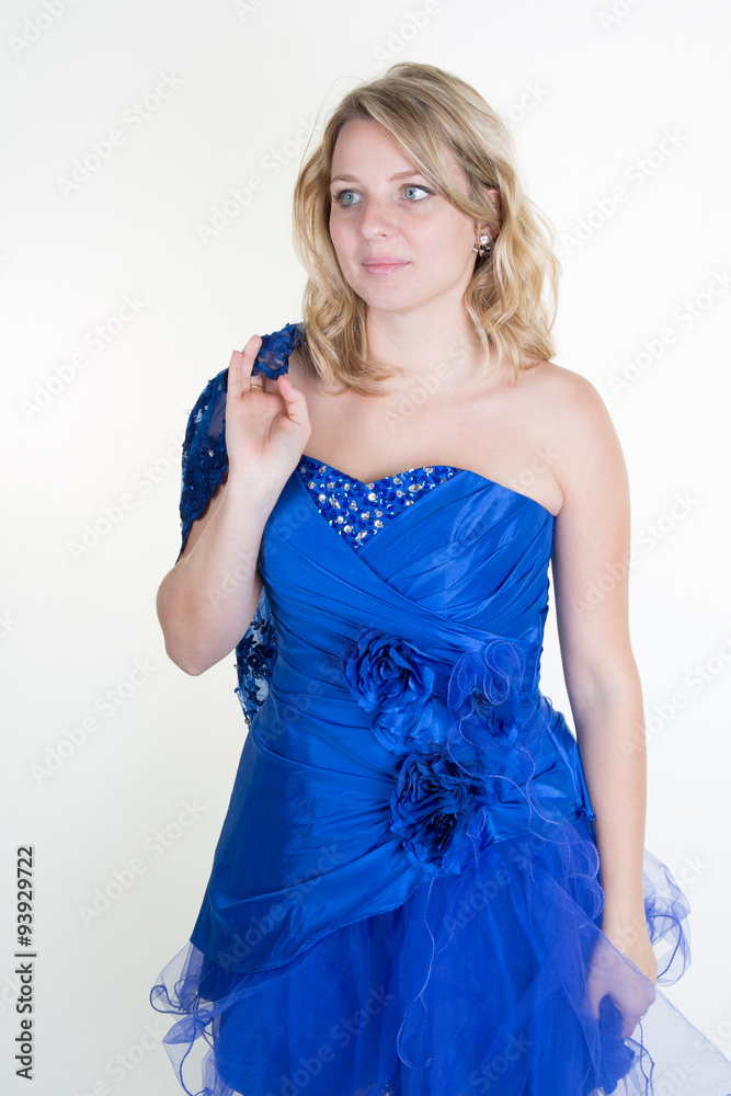 Gorgeous young blond woman with a beautiful blue dress Gorgeous young blond woman with a beautiful blue dress