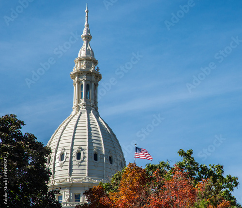 Michigan state capitol building in Lansing with autumn colors