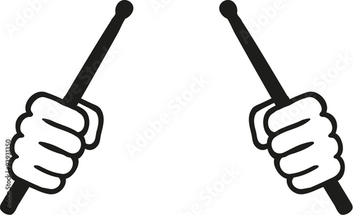 Two hands with drum sticks
