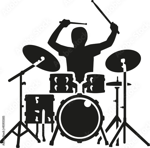 Drum kit with drummer in action