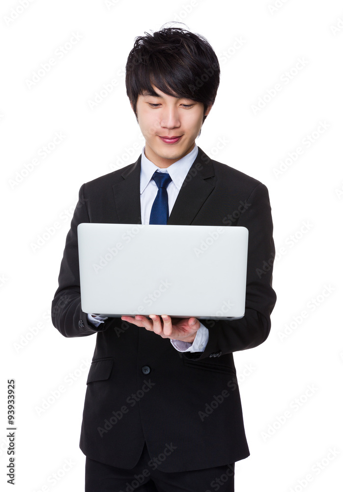 Asian businessman use of the laptop computer Asian businessman use of the laptop computer