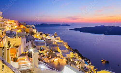 Santorini at night with twilight sky above Mediterranean sea, Greece 