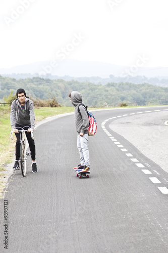 child with skateboard outdoors