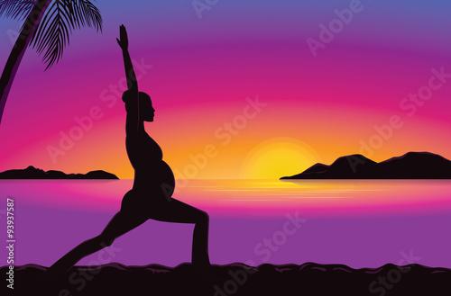 Silhouette of pregnancy woman doing exercise with yoga  in seaside at the sunset time for good prenatal.
