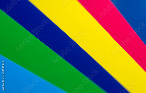 Colorful background from sheets of paper different colors