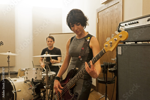 Young musicians practicing at recording studio