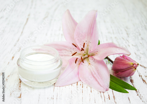 Face cream with lily flowers