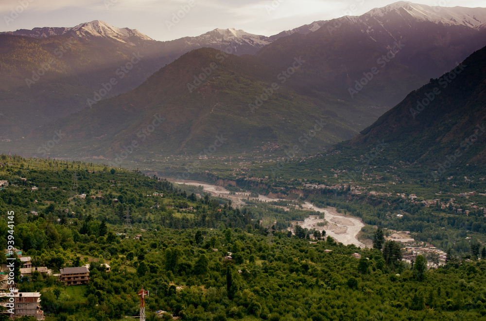 Evening view of Kulu valley with Himalaya range in background