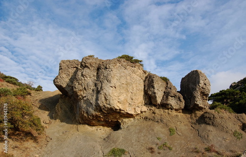 Picturesque sandstone rock in the autumn Crimean Mountains.