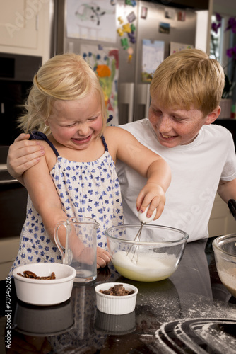 Brother and sister whisking