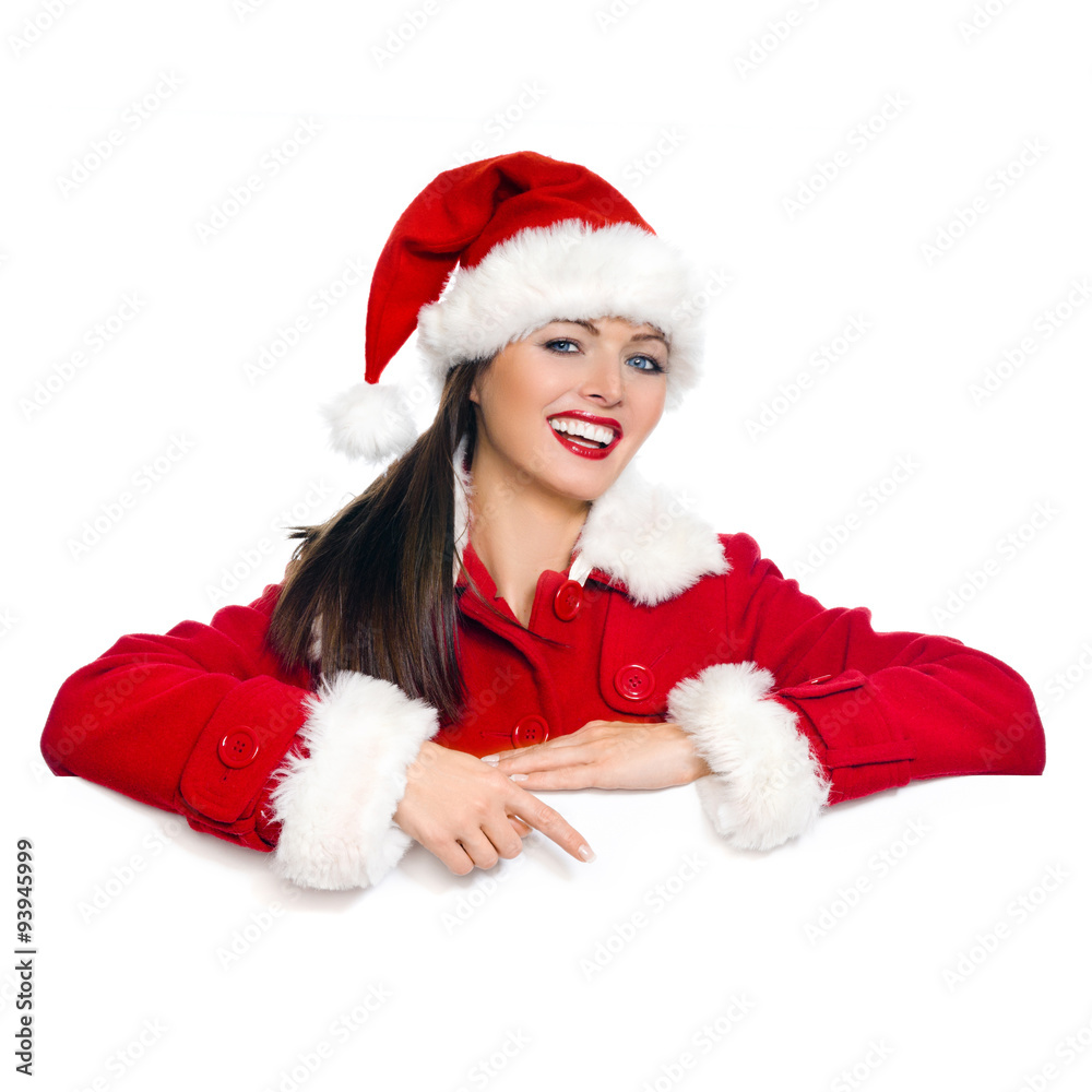Weihnachtsfrau zeigt mit Finger auf Plakat Weihnachtsfrau zeigt mit Finger auf Plakat