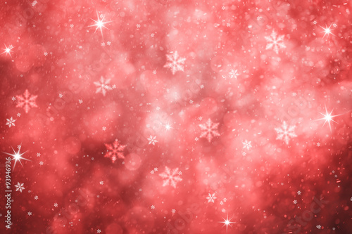 Red colored abstract blurry snowfall Christmas and New Year illustration background with sparkle. Lovely red colored holiday greeting card with copy space background.