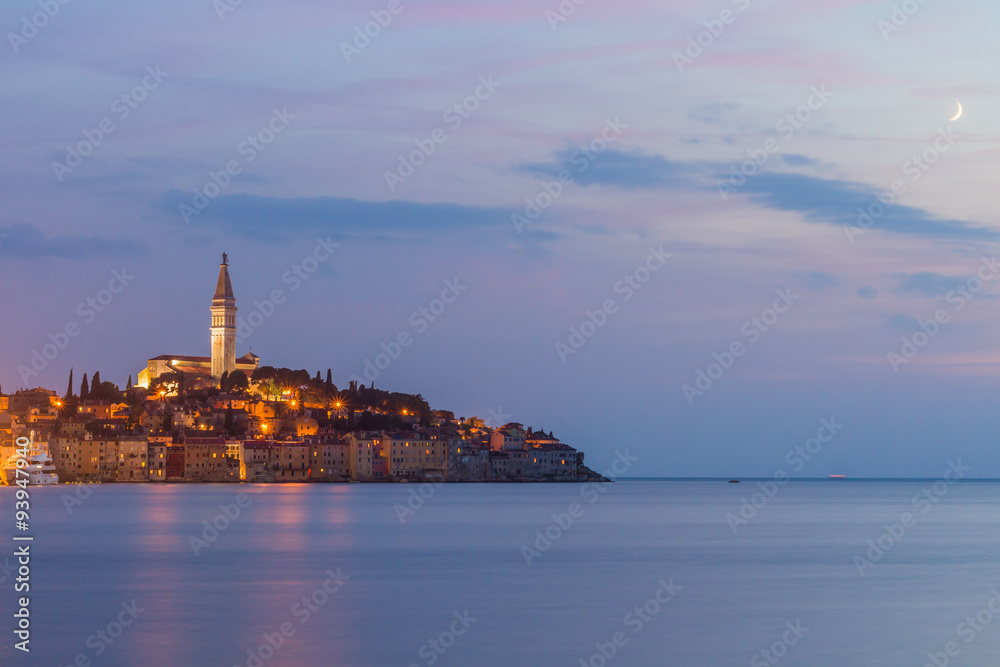 Fototapeta premium Beautiful romantic old town of Rovinj after magical sunset and moon on the sky,Istrian Peninsula,Croatia,Europe